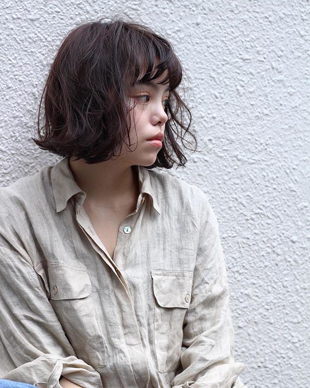 無造作パーマスタイルでセンスが光るショートスタイルに Folk